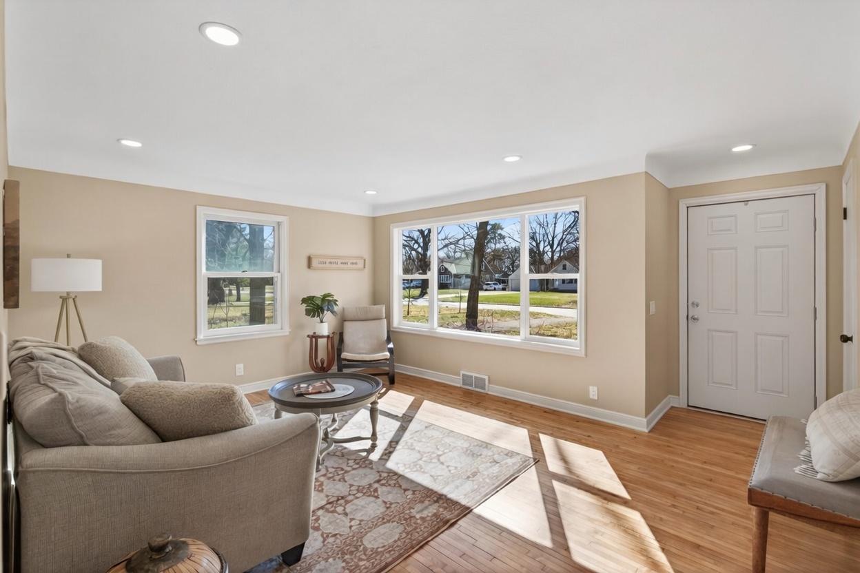 Bright and inviting, highlighted by a large picture window that fills the space with natural light.