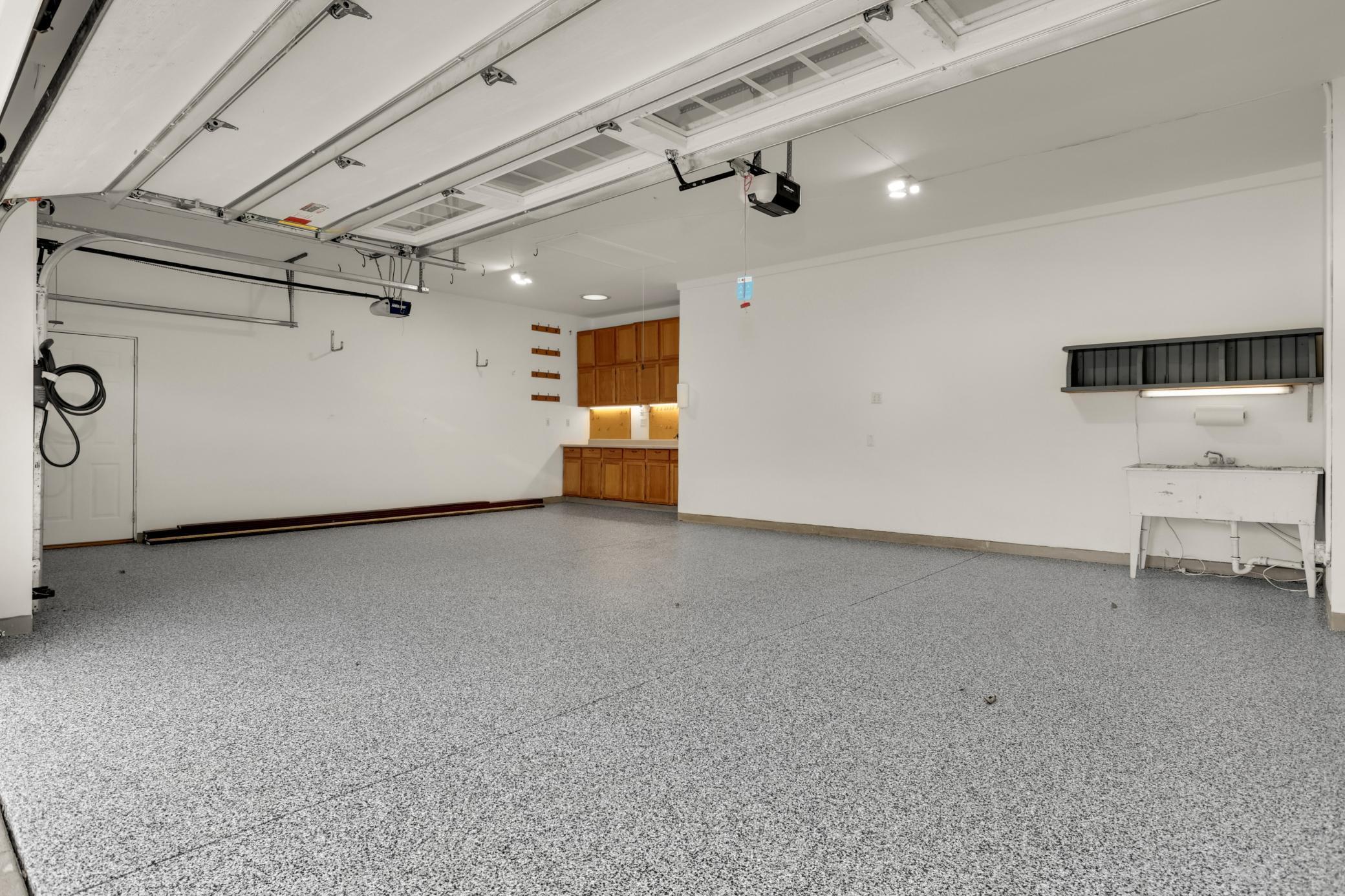 Garage newly epoxy floors and an EV Car Charger