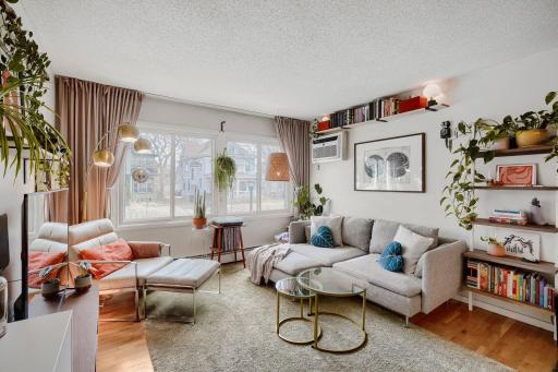 Street facing, 2nd floor corner unit with eastern exposure for sunny mornings