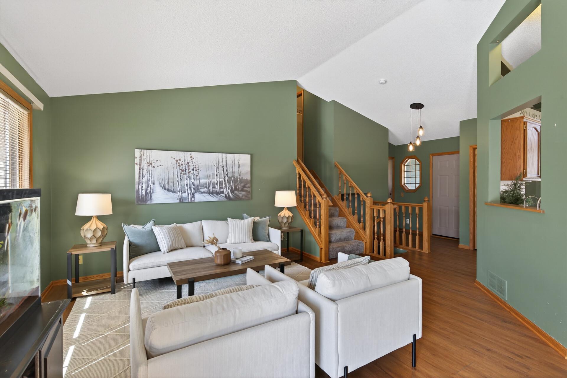 Large windows allow abundant natural light to stream in creating for a bright living space.