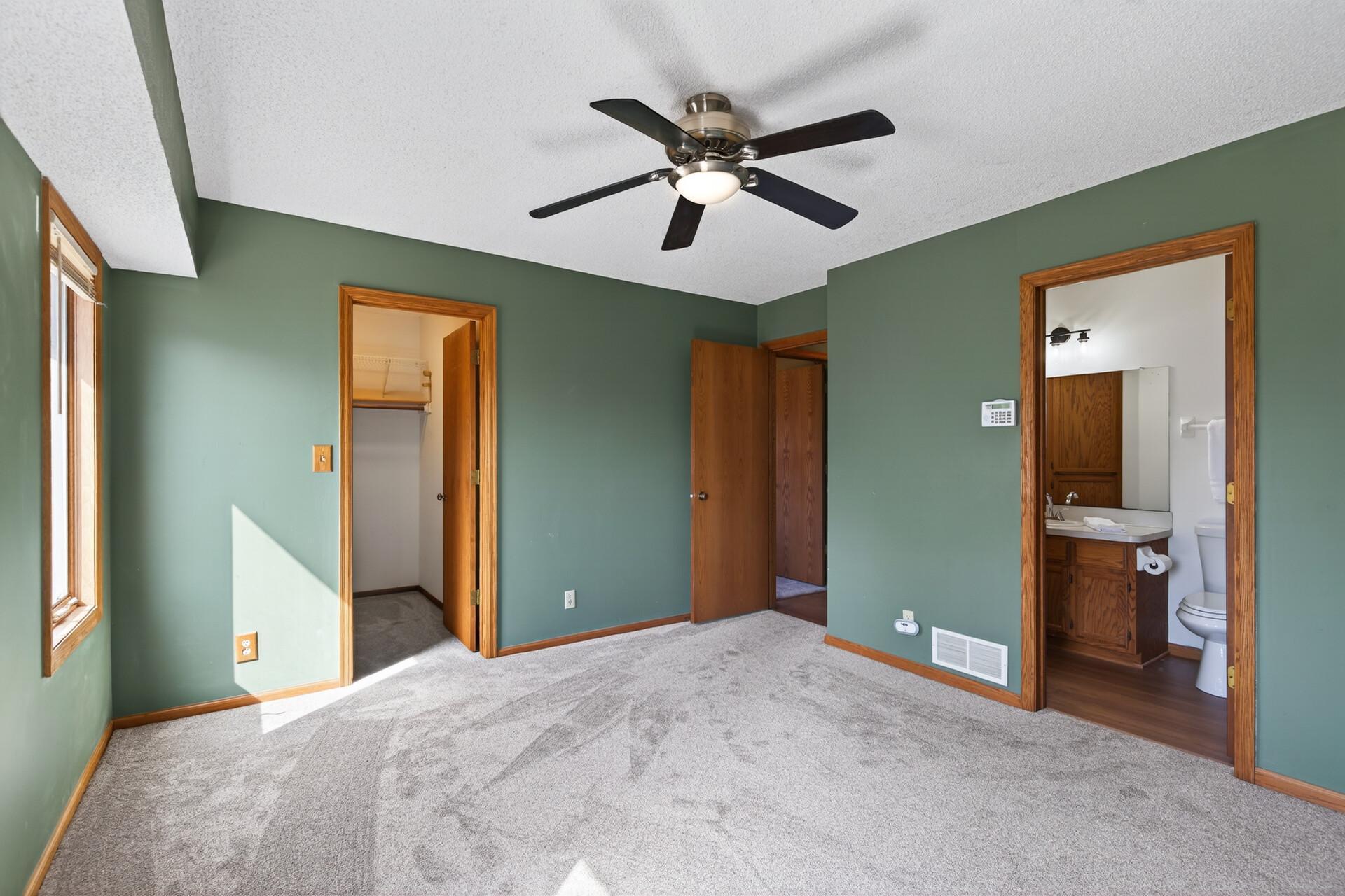 The primary bedroom also includes a walk-in closet and private 3/4 bath.