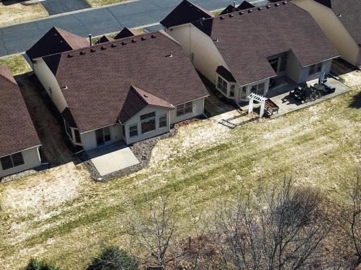 A patio and backyard perfect for entertaining, grilling, and enjoying outdoor games!