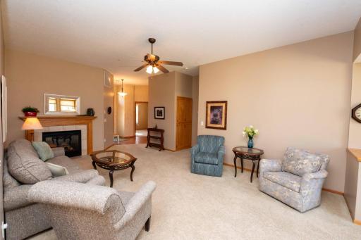 As you enter, tall ceilings throughout the home create for an open atmosphere.