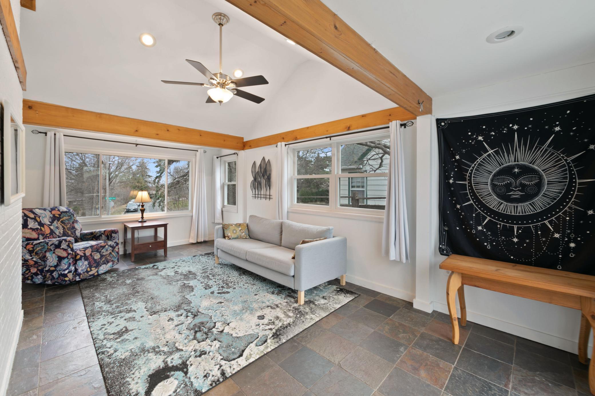 Bright sunroom with slate flooring