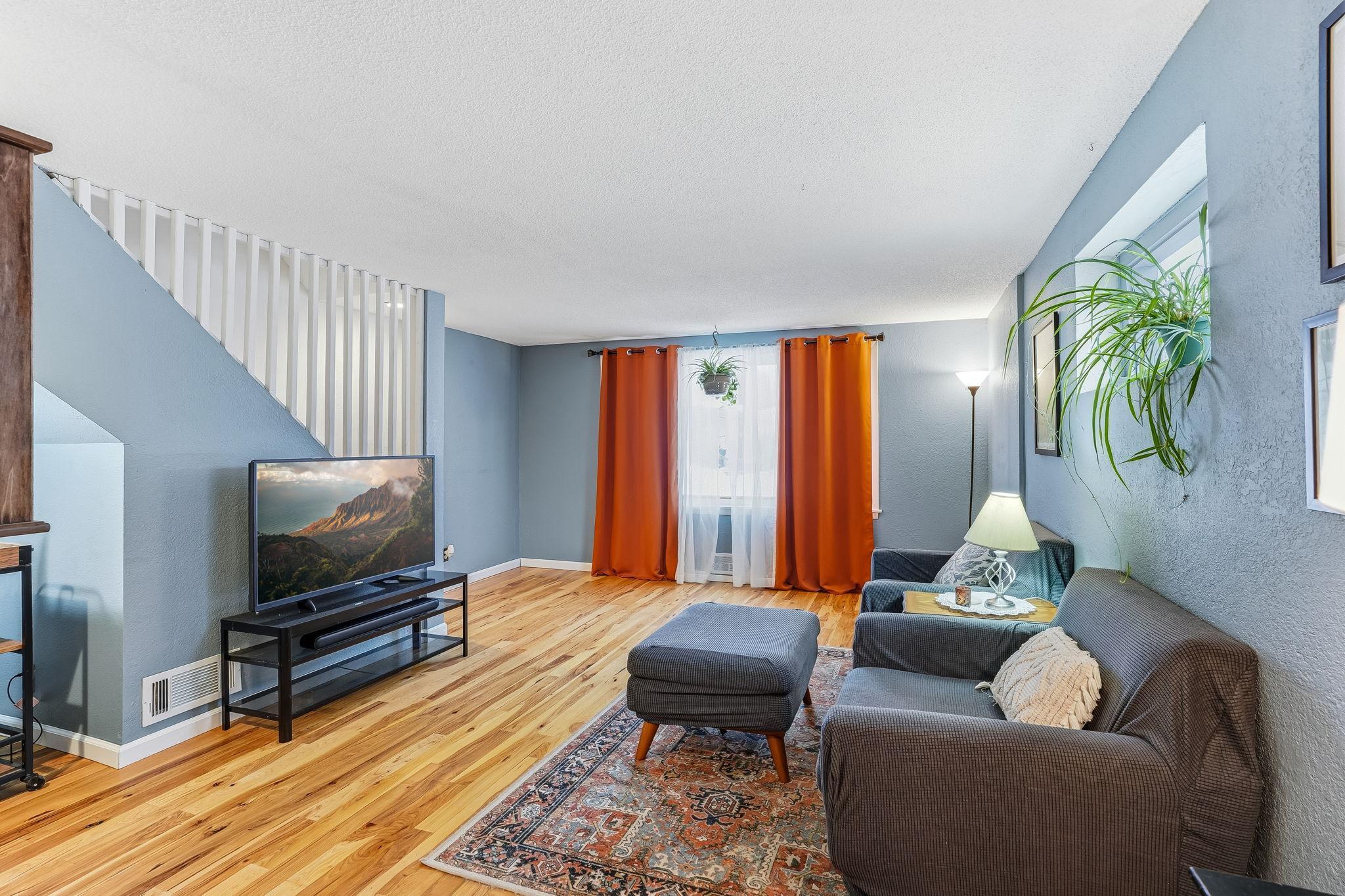 Living room has large picture window