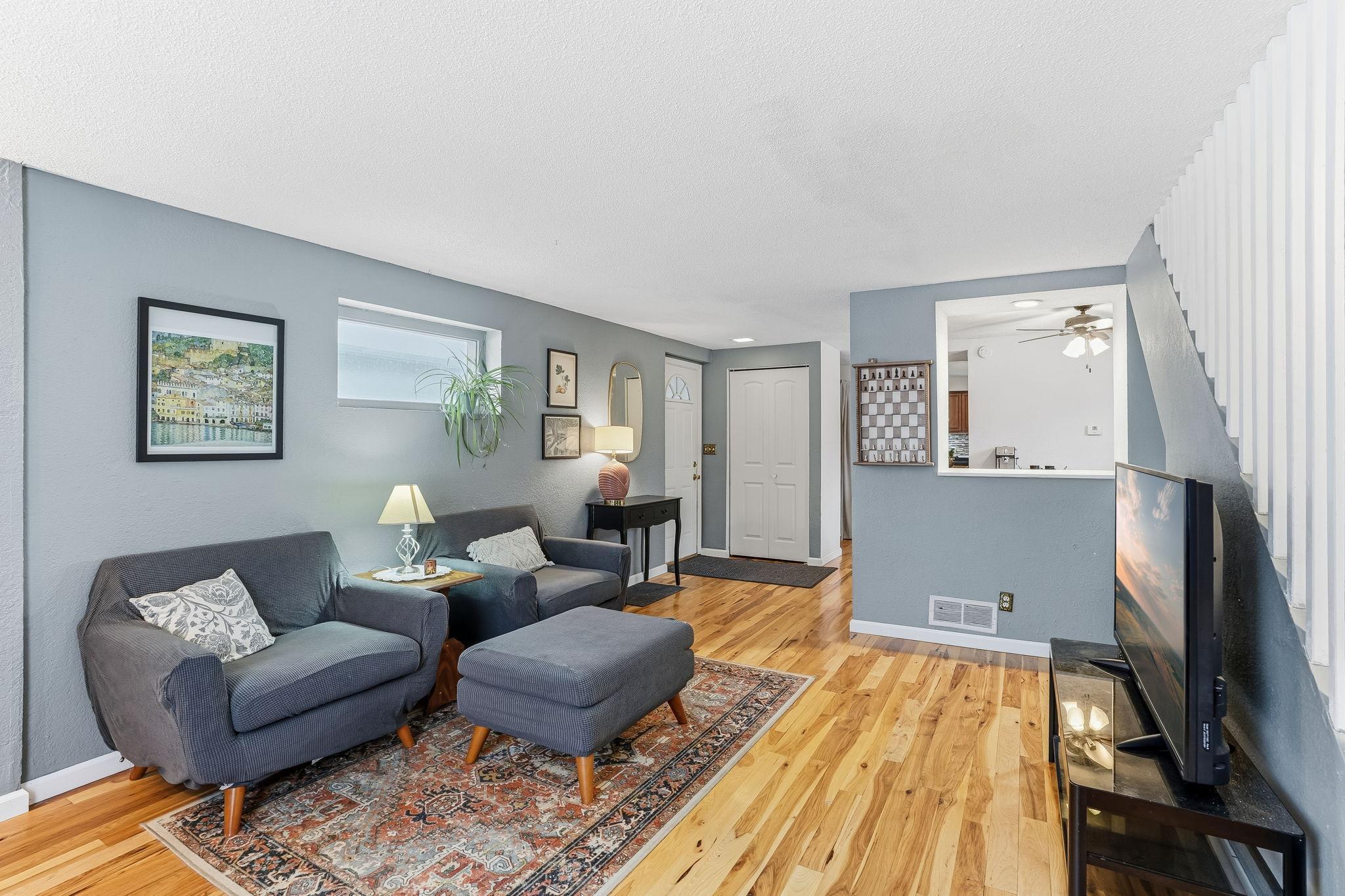 Main floor living room and foyer have HWF, new paint.