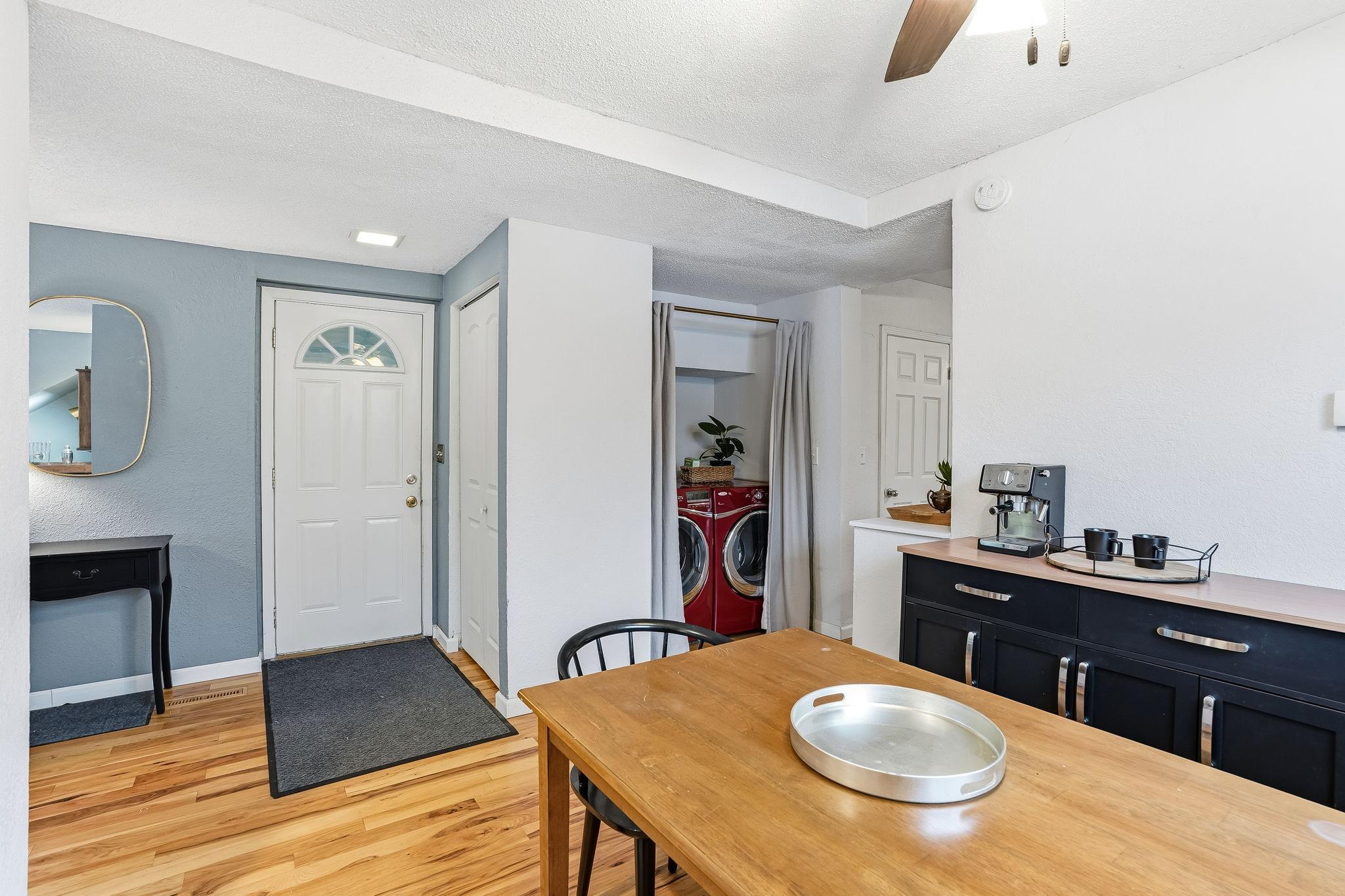 Hardwood floors from dining into kitchen