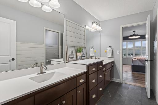 The 3rd and 4th upper level bedrooms share a Jack and Jill style bathroom