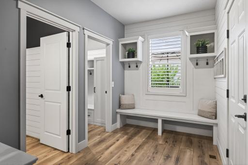 Entry from the garage provides storage and 1/2 bathroom