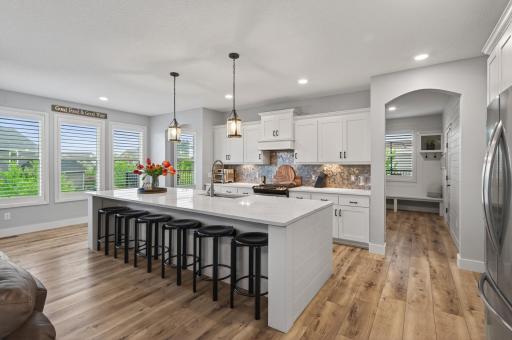 Wonderfully updated kitchen with large center island great for food prep, buffet style eating or quick meals