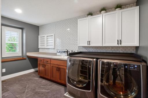 Upper level laundry complets the upstairs