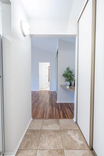 4548 Cedar Lake Rd S _ Welcoming interior entry with warm flooring and clean, neutral finishes.