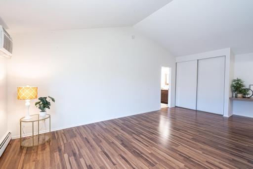 4548 Cedar Lake Rd S _ Spacious living/family area with fresh paint from top to bottom, including the vaulted ceiling.