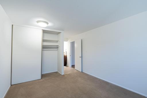 4548 Cedar Lake Rd S _ Functional layout and large closet within the bedroom.