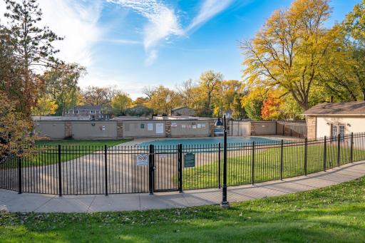 4548 Cedar Lake Rd S _ Outdoor community pool and patio. Additionally, there are picnic tables and grills located throughout the community grounds.