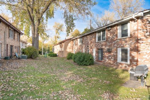 4548 Cedar Lake Rd S _ Well-maintained community with expansive green space and established landscaping.