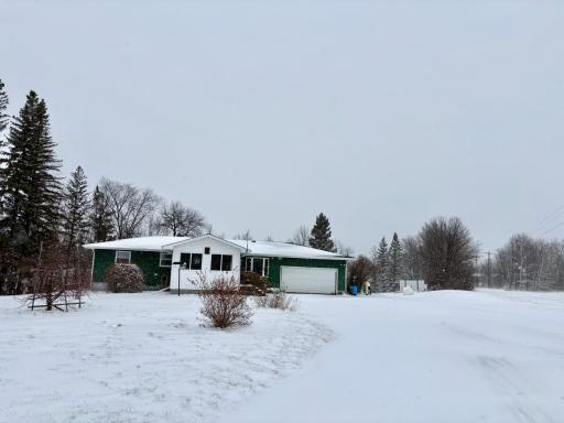 One level home with sunroom and attached garage