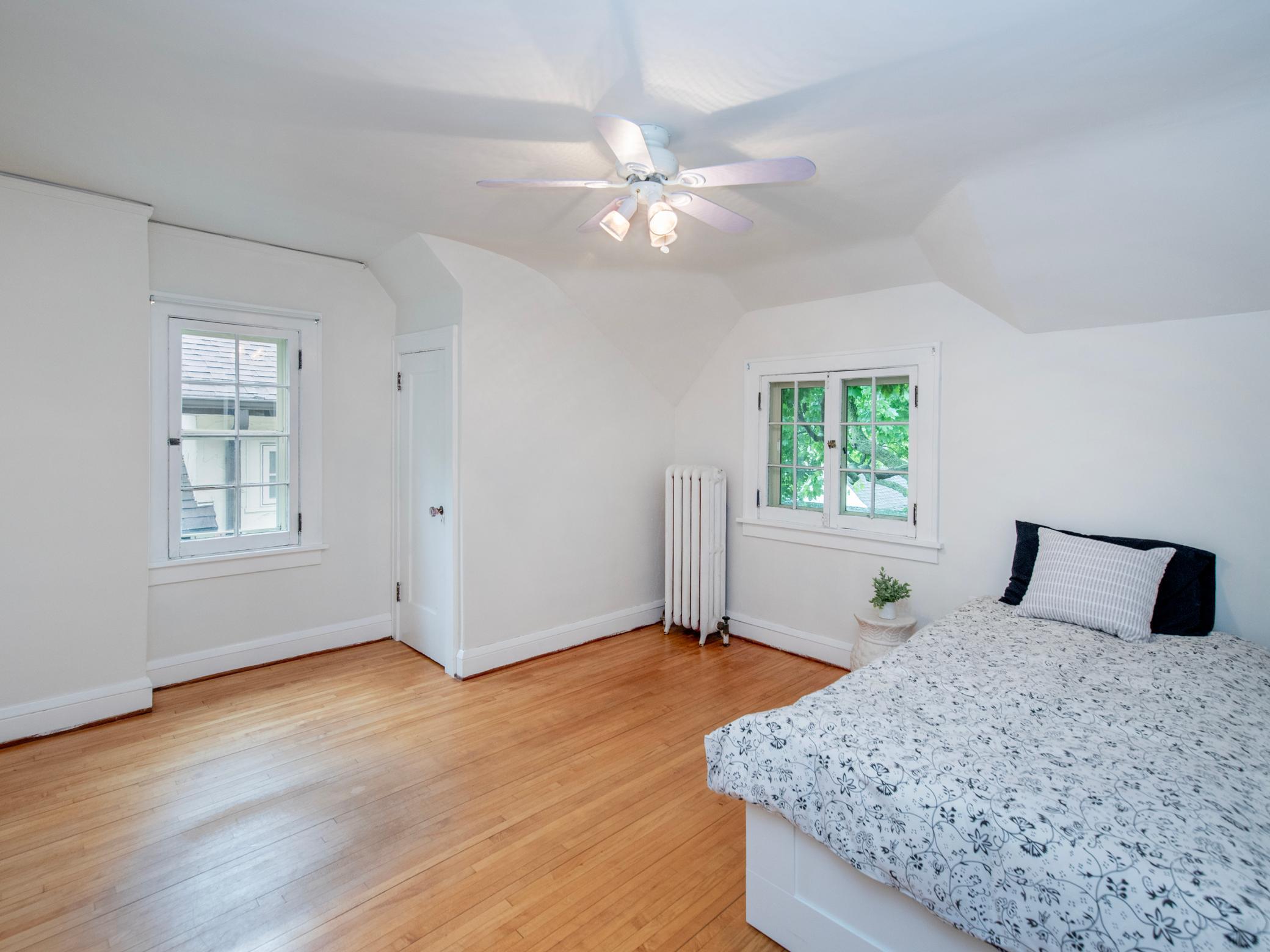 Light and bright second bedroom on the upper level.