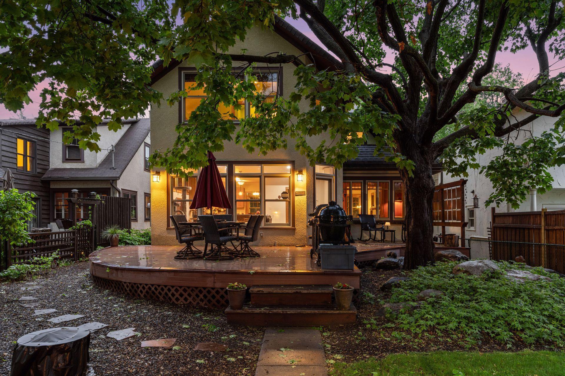 Lucious greenery and mature trees provide serene views and privacy to the backyard.