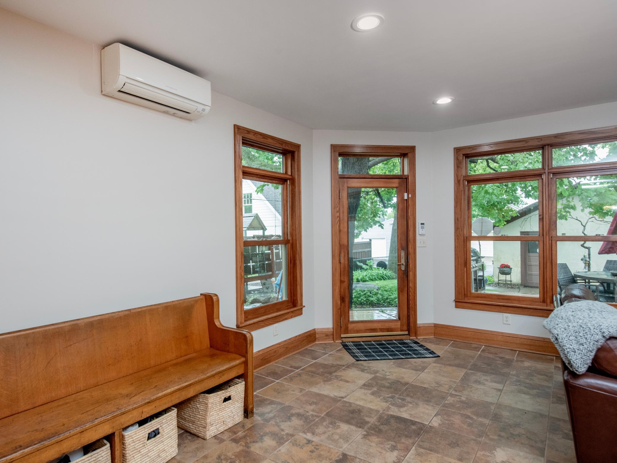 Convenient access to the deck and backyard, ideal for outdoor entertaining and barbecues.