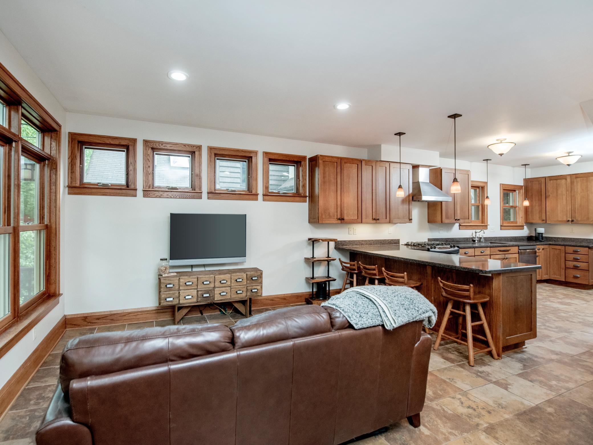 Family room seamlessly flows from the kitchen, creating an open and connected living space.