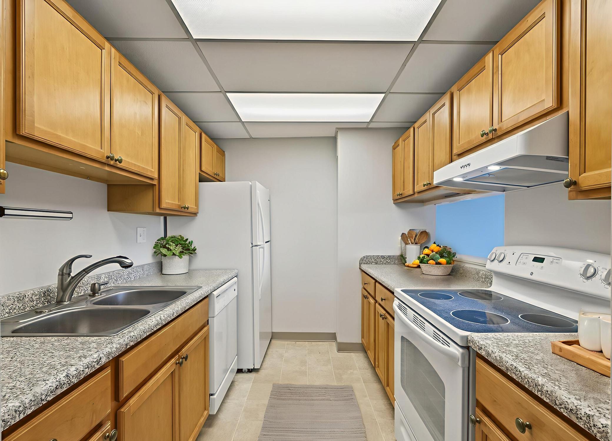 Light and bright kitchen with pass through- Virtually staged