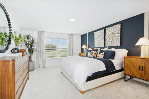 (Photo of model home, features will vary) Nestled on the top floor, the private ownerâs suite boasts a spacious bedroom to provide restful nights and a tranquil haven for relaxation, complemented by an en-suite bathroom and large walk-in closet.