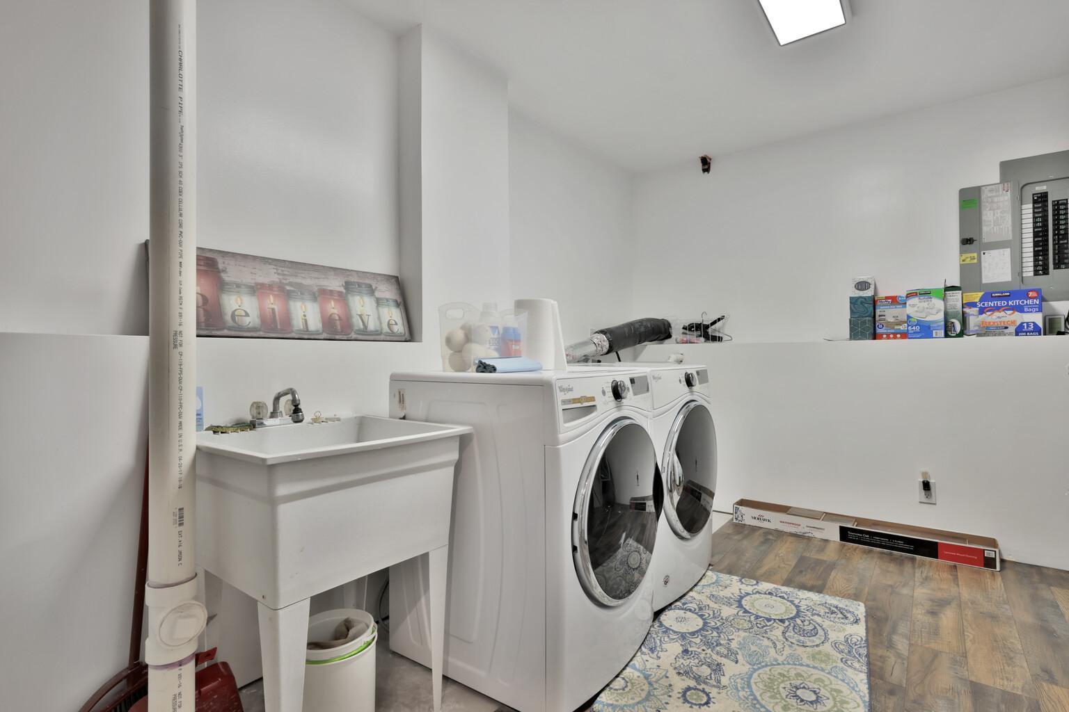 Spacious finished laundry/mechanical room