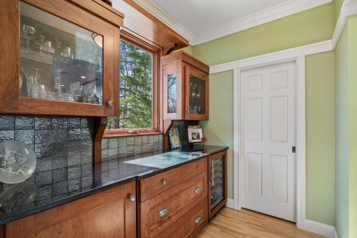 Butler's pantry with a walk-in pantry and there are plenty of places to store what you desire and for all your food to be organized. Great space in the pantry!