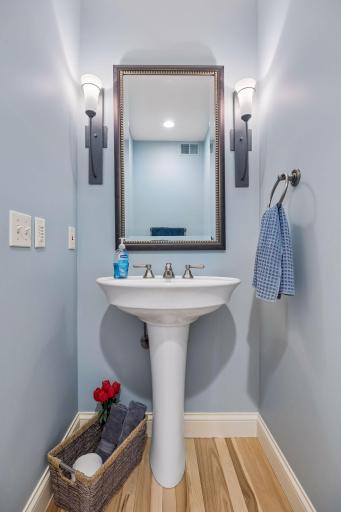 Main floor powder room which is awesome for guest use.