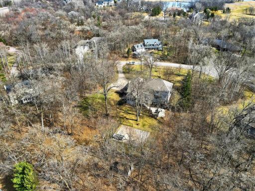 Aerial view of 18650 Verna Lane. Great trees.