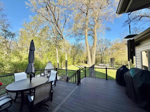 Both the informal dining area and porch walk out to the fabulous rear deck with glass rails!