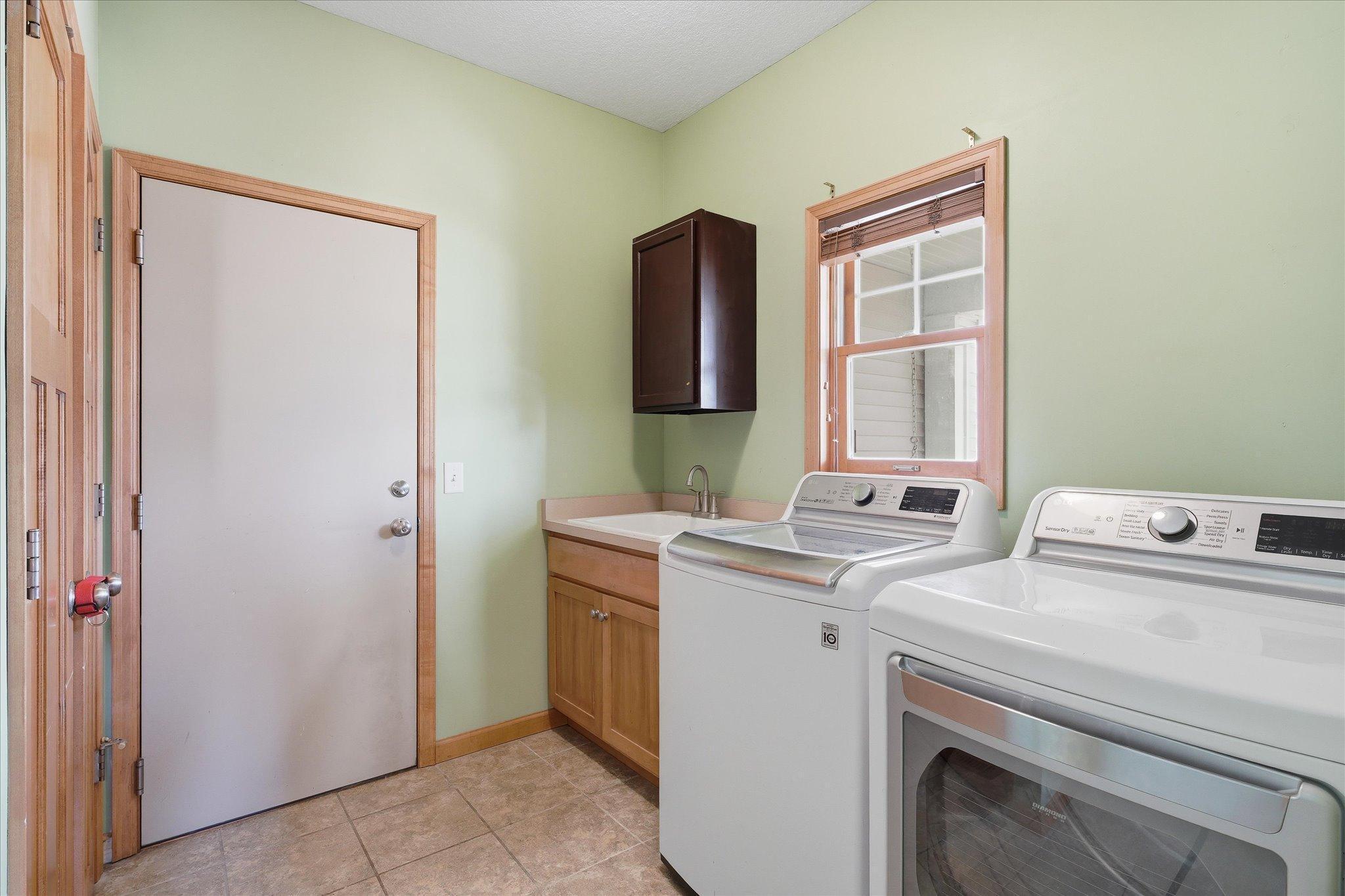 Laundry room on main floor, leading to garage.