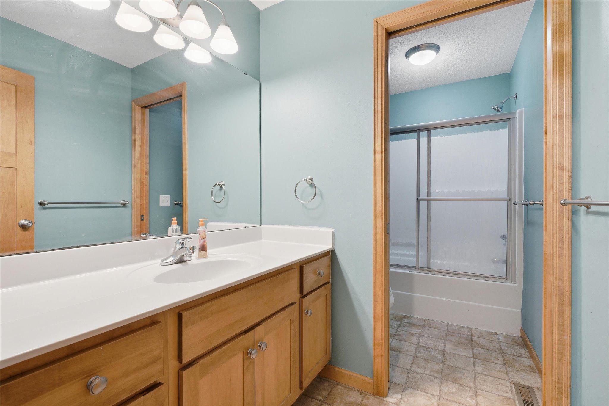 The two bedrooms on the upper level share a full bath which conveniently offers a separation between sink and toilet/tub.