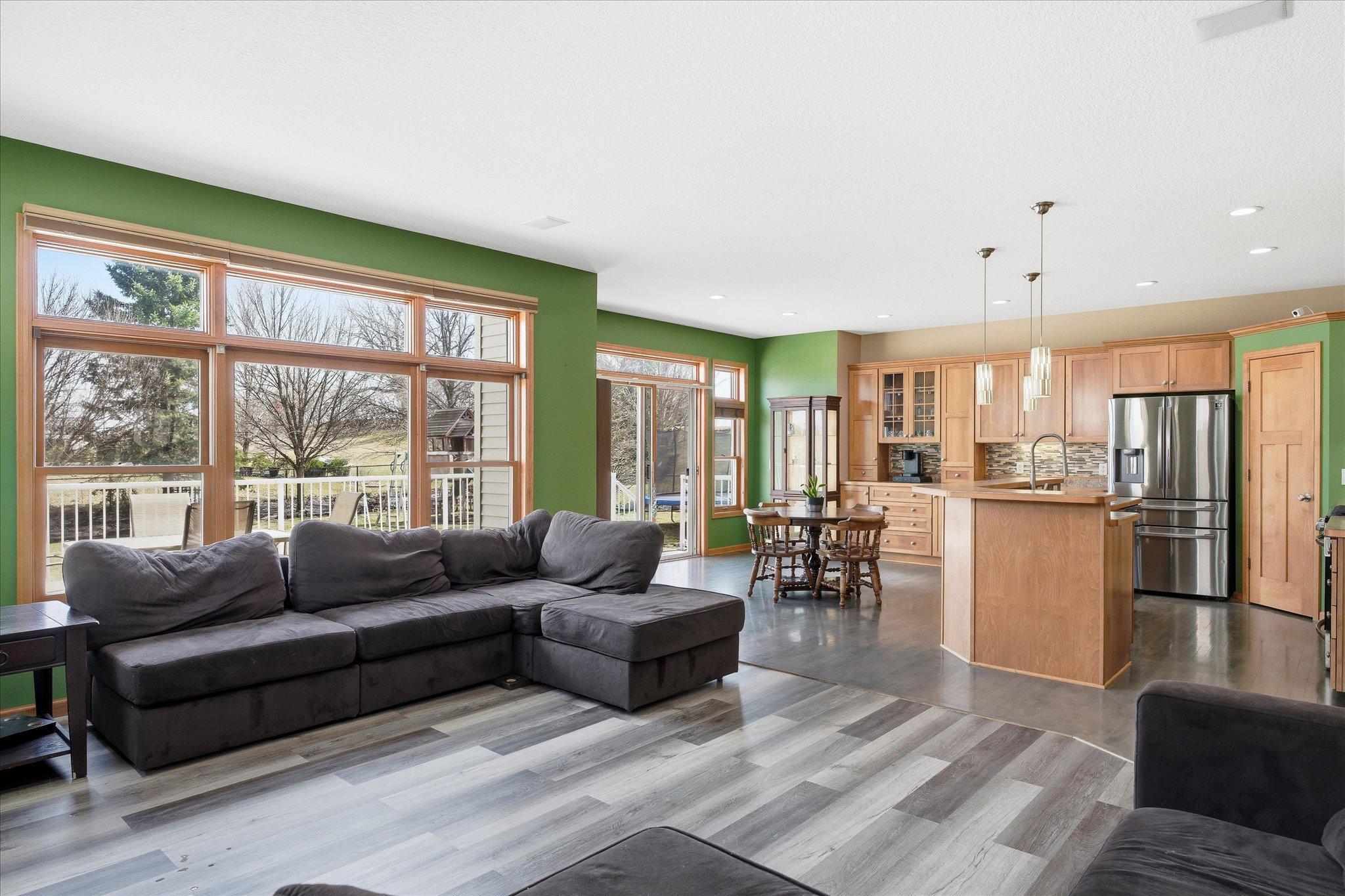 Open layout ties the Living Room with the Kitchen and Dining ... great for families and entertaining!