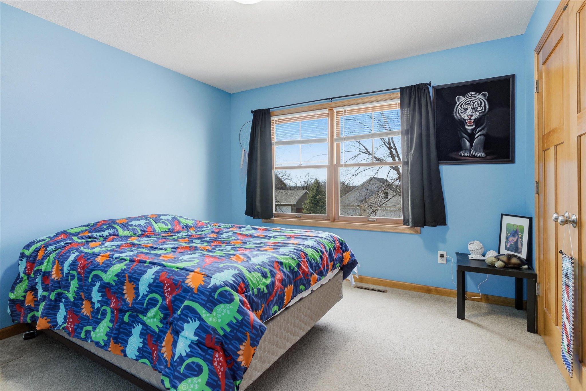 Third spacious bedroom on upper level.