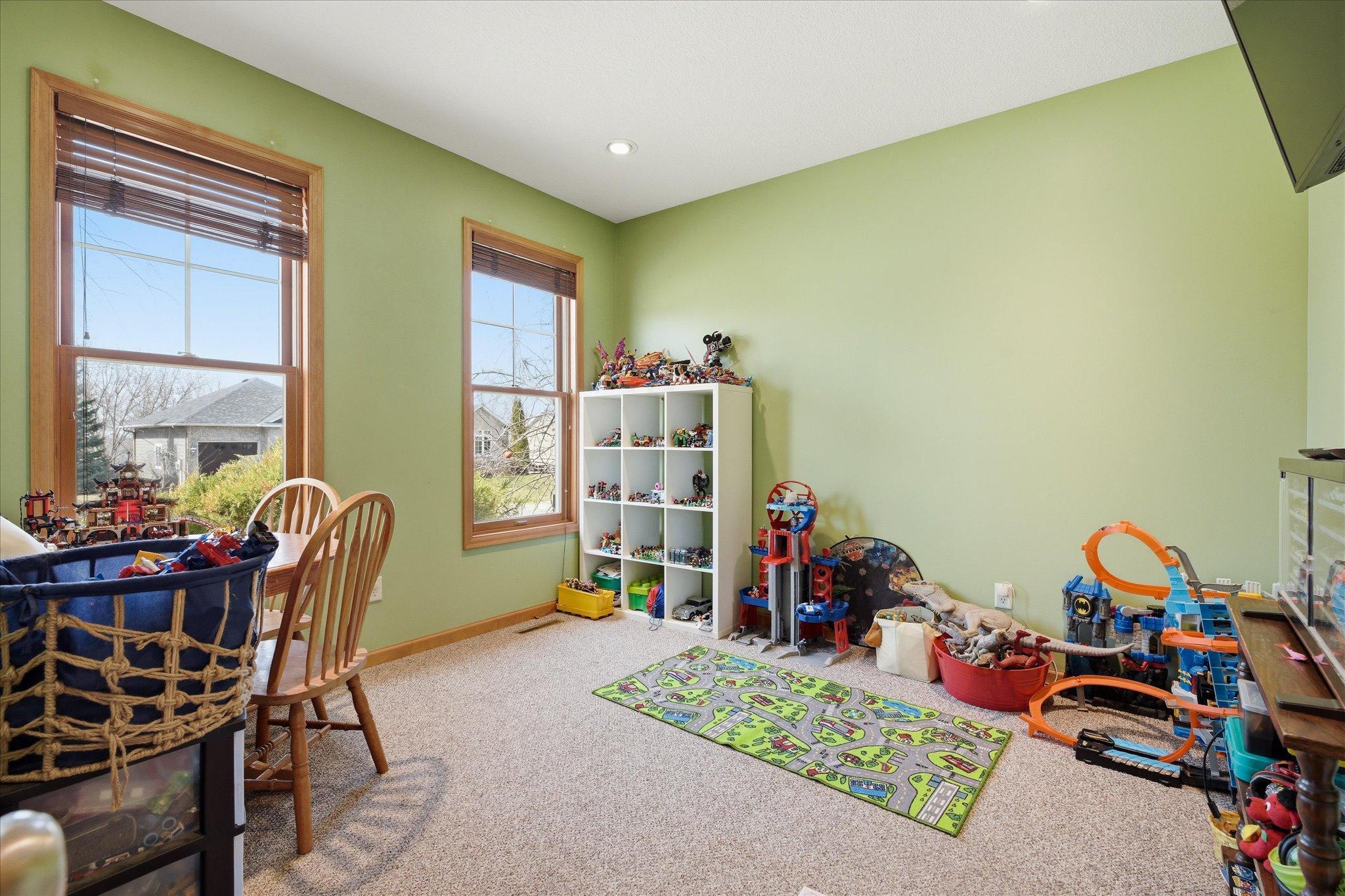 Nice front room could be a wonderful office, music room, formal dining, or play room as it is now.