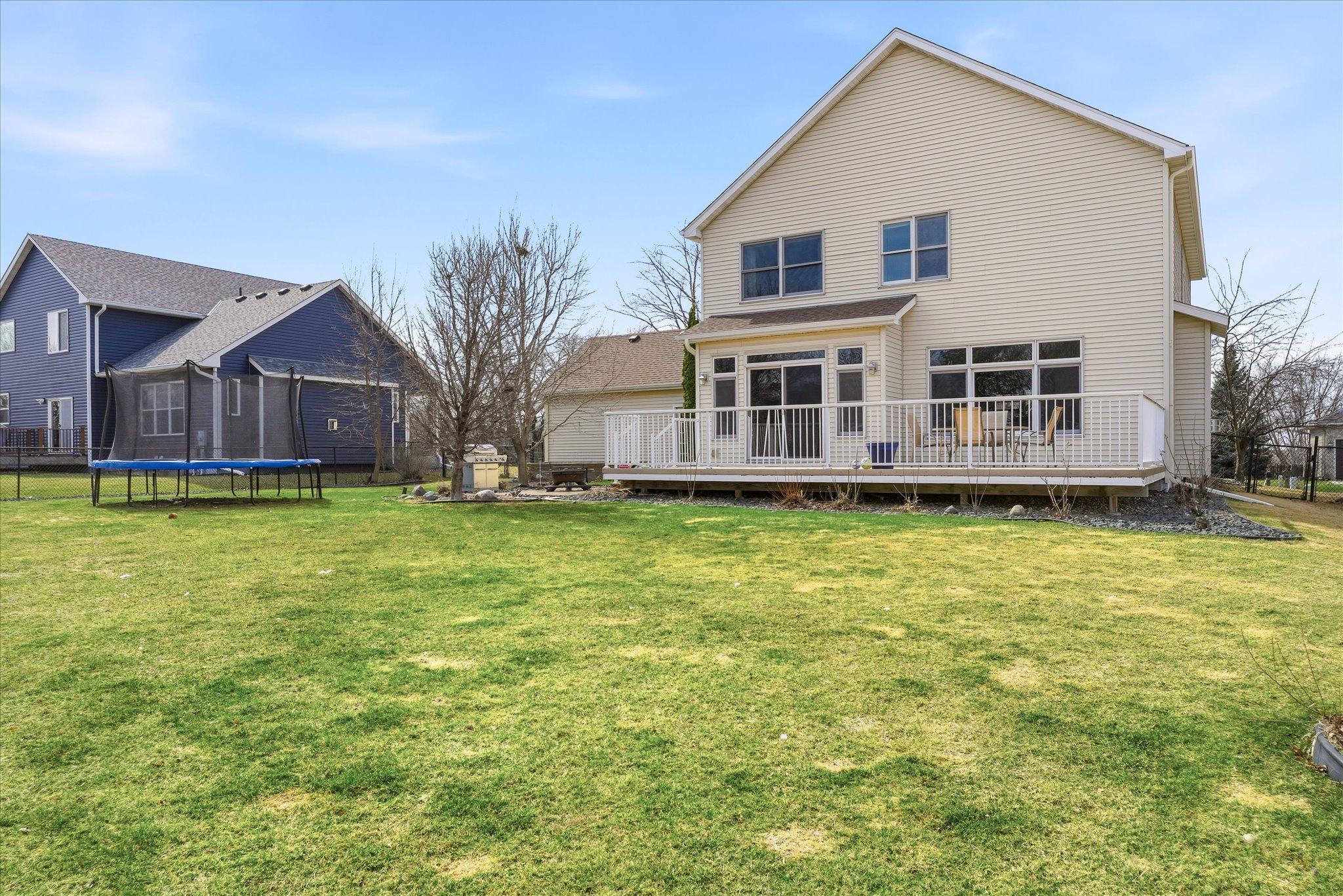 Back yard is open and level and wonderful for kids and pets!