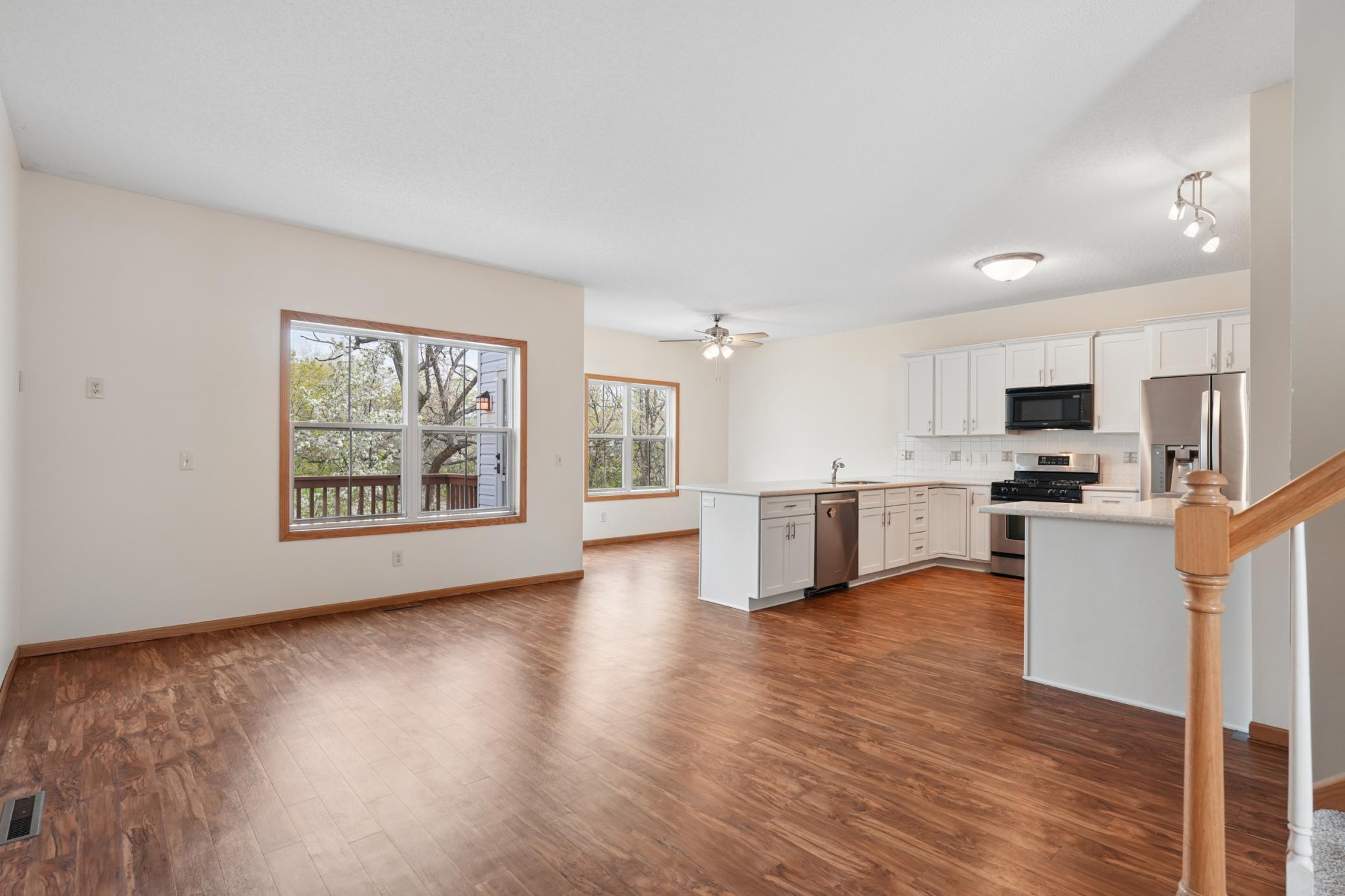 Open concept Main Level living with updated kitchen and views of the pond