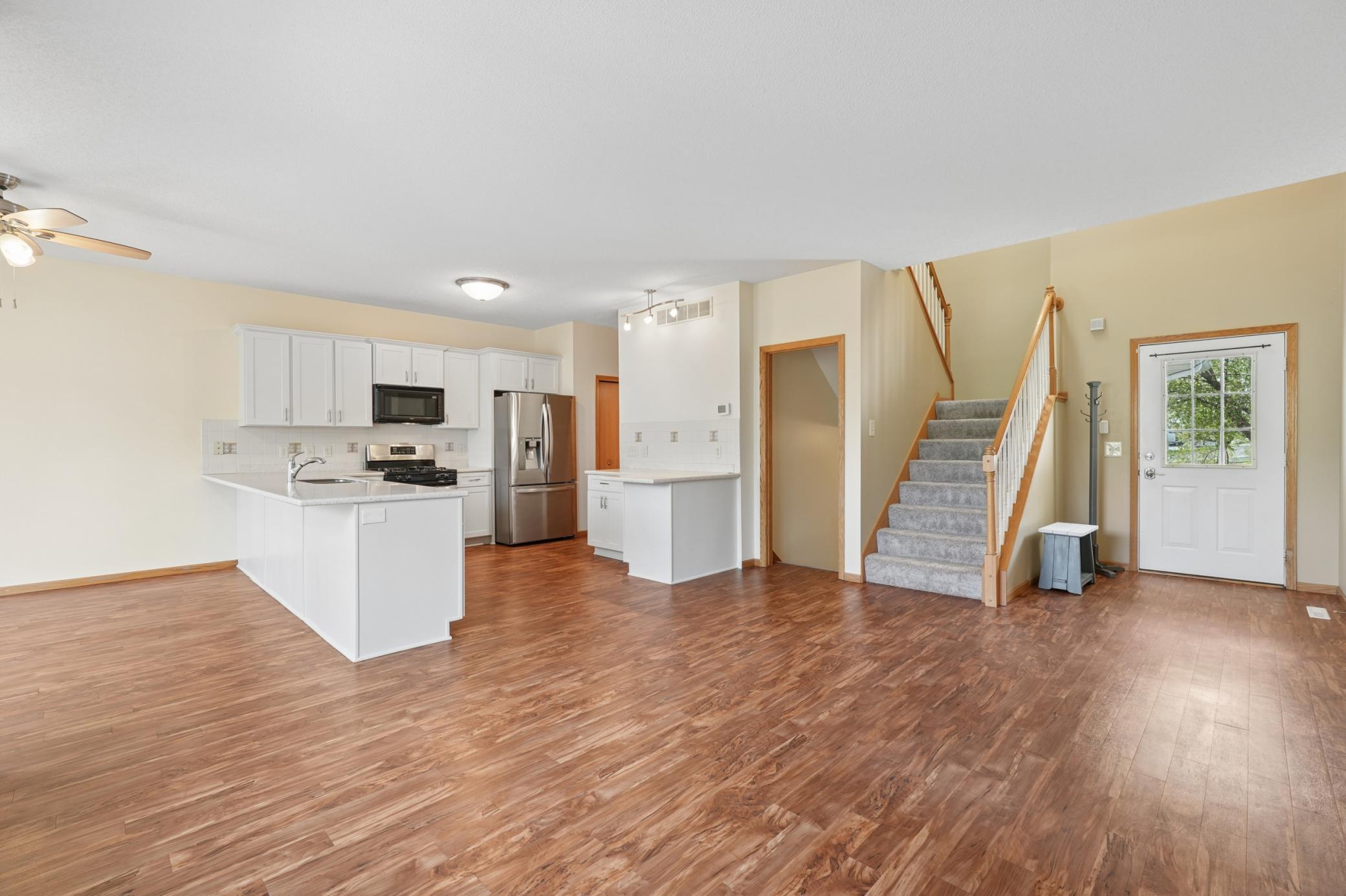 Open concept Main Level living with updated kitchen and views of the pond
