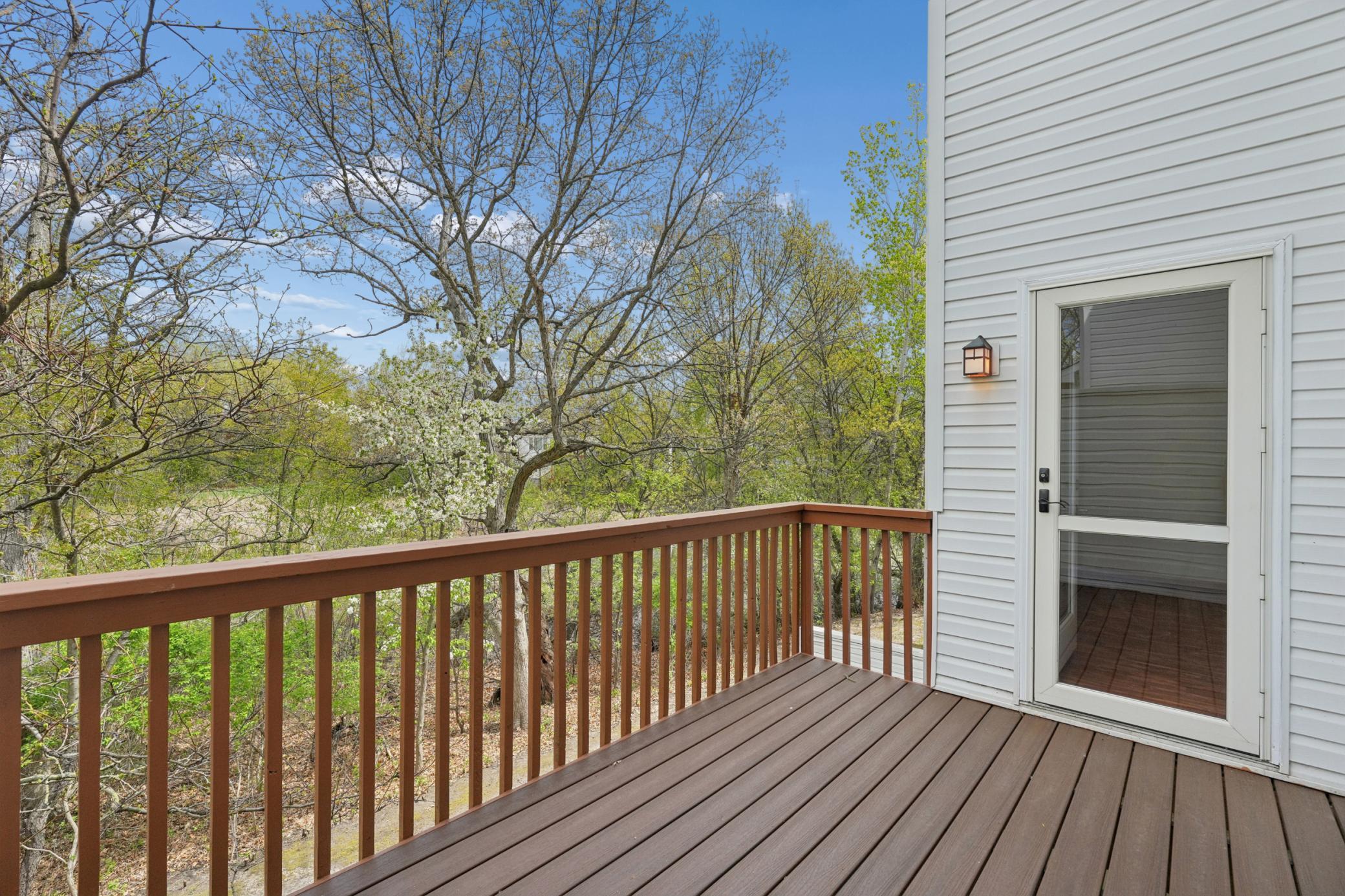Updated low maintenance decking with views of the pond