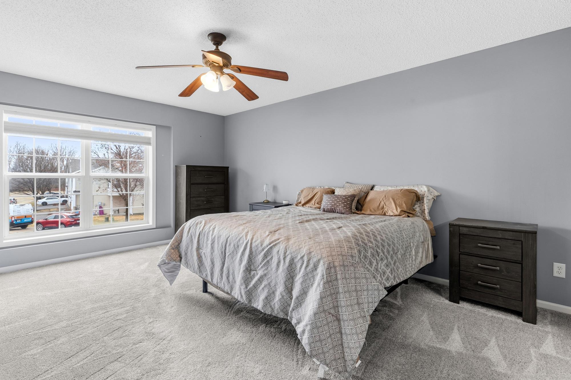 A large master bedroom with a fantastic walk-in closet.