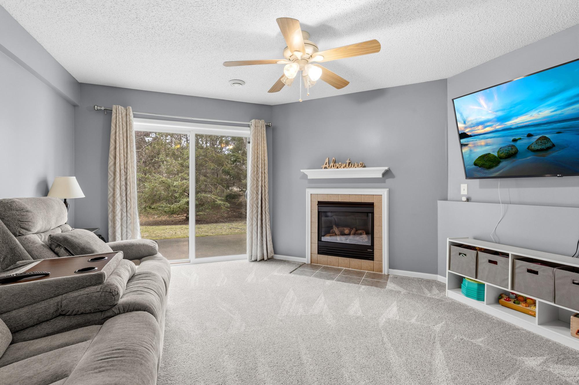 A walkout basement with a gas burning fireplace in the family room.