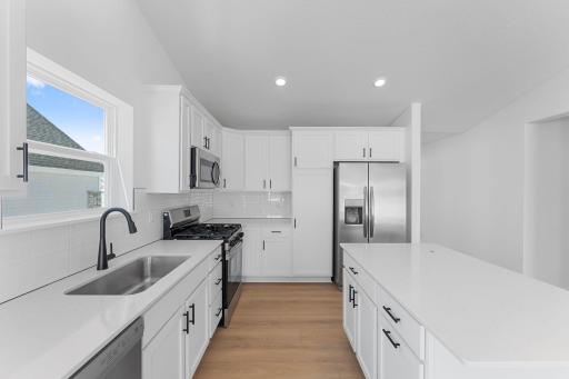 (All the following photos are of a similar home, actual finishes may vary.)