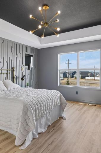 modern primary suite with ensuite