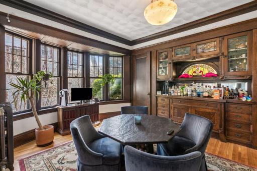 Built in buffet with stained glass windows and two additonal storage closets