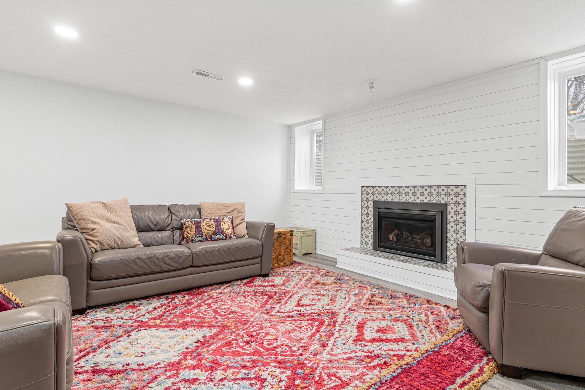 HUGE Lower level family room w/ fireplace