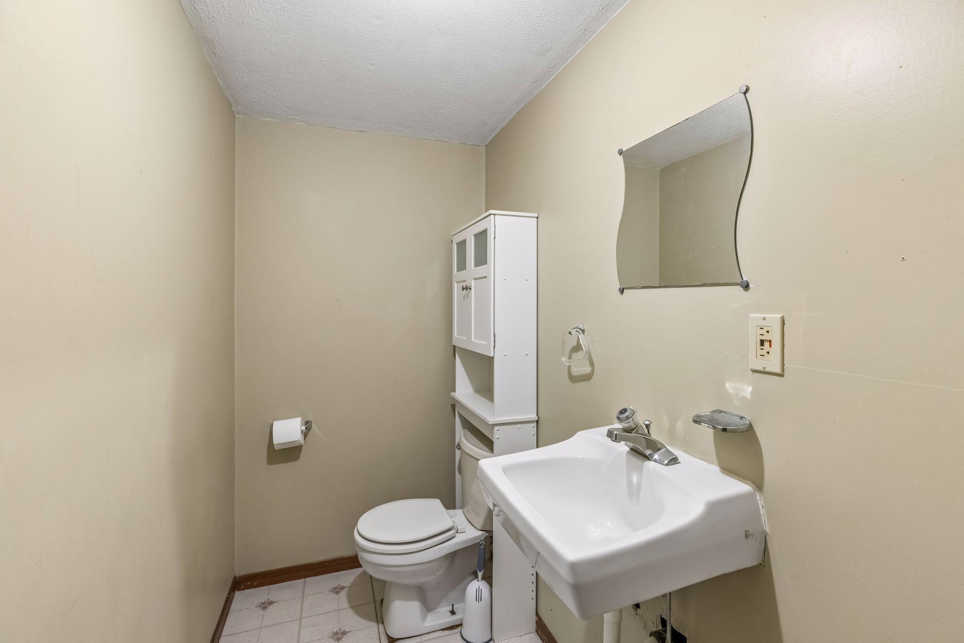 Lower level half bath.