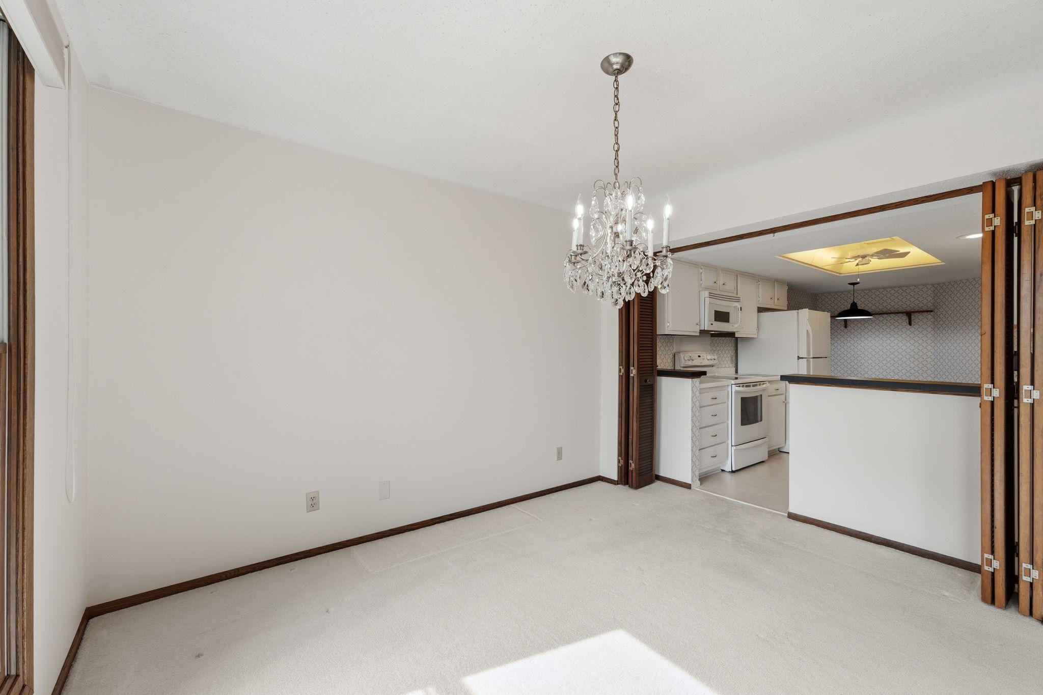 The dining room is open to the kitchen