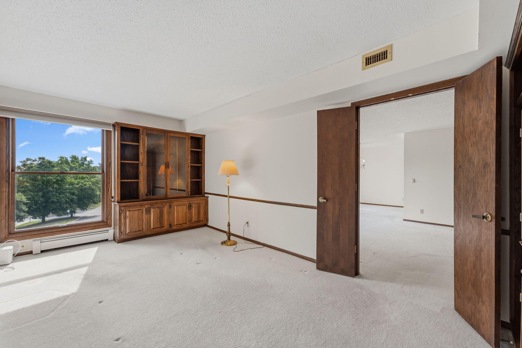 The bonus den space has lovely built ins.